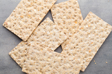 Stack of wholegrain crispy bread with sunflower, chia and sesame