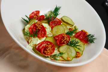 cucumber and cabbage salad with sausage and whole grain french m