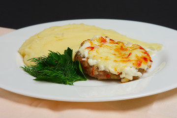 Meat cutlet with cheese and mashed potato