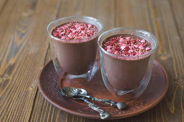 Chocolate panna cotta with cinnamon hearts and roses for Valenti