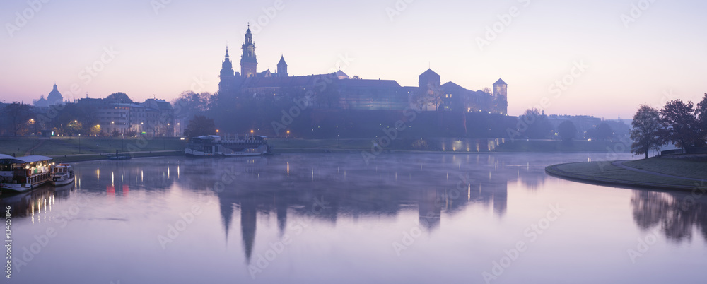 Wall mural panorama of blue morning on the river with castle