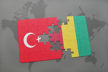 puzzle with the national flag of turkey and guinea on a world map