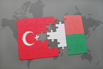 puzzle with the national flag of turkey and madagascar on a world map