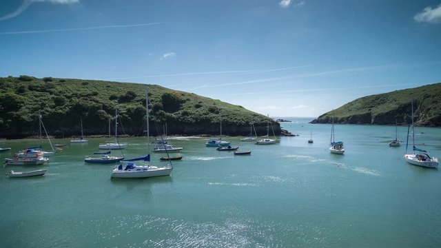 epic timelapse shot filmed over 7 hours of  the port of Solva in Wales. during this long period of time the water empties out of the bay into the sea leaving the boats stranded in sand