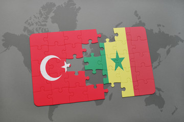 puzzle with the national flag of turkey and senegal on a world map