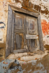 Old window on an old traditional house in the main village of the island.