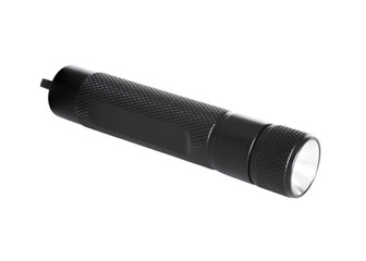 Metal flashlight on white