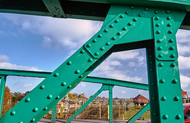 The steel construction of the road bridge over the railway tracks in Gniezno.