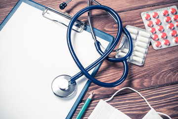 Desk of doctor with medicine things
