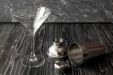 martini cocktail at wooden background close up