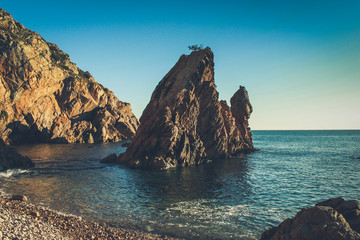 Amazing Wild rock beach at the sunset. Sintra Cascais Natural Park Portugal
