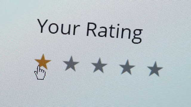 Close up shot of a computer screen with an online rating and review survey feedback poll getting a bad one star review by the customer.