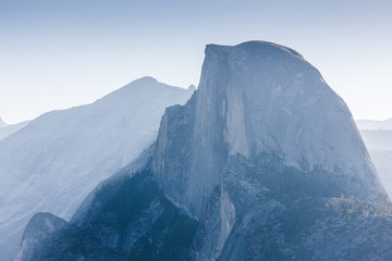 Half Dome Rock in early morning mist from Glacier Point, Yosemit