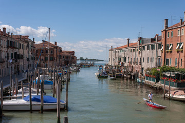 Fototapeta na wymiar View into a canal in Giudecca Island, Venice, Italy