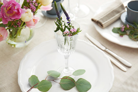 Flower arrangement on table served for wedding dinner