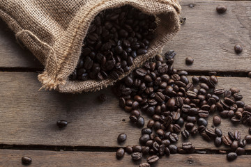 coffee cup and coffee bean on wooden background