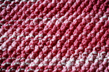 Handmade knitted fabric background - blanket for baby girl