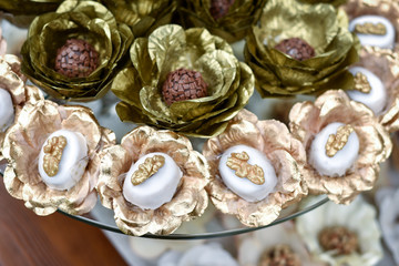 Decorative Candies and Pralines in Shiny Paper Wraps