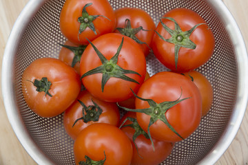 Fresh tomatoes with green leaf