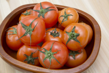 Fresh tomatoes with green leaf