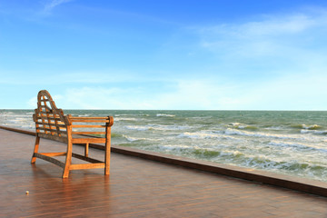 Chair in front of the blue ocean