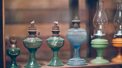 Old collection of the oil lamps lanterns vintage style.