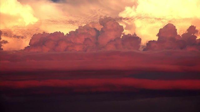 Large thunderhead clouds forming in the sky at sunset in Sarasota, Florida, timelapse
