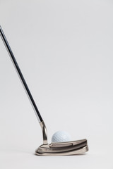 golf ball and putter on White background