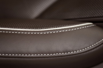 Modern leather car seat detail. Macro photo.