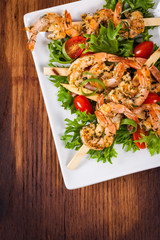 Grilled Shrimp Skewers Summer Healthy Salad. Selective focus.