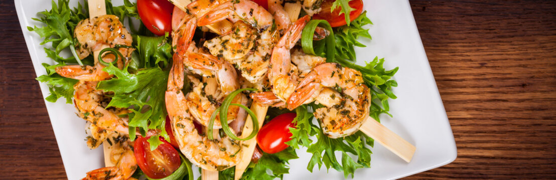 Grilled Shrimp Skewers Summer Healthy Salad. Selective focus.