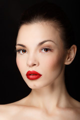 Sensual portrait of a girl with red lips. Makeup simple and catchy.