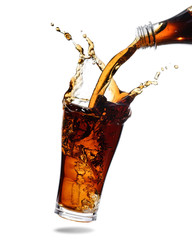 Pouring cola from bottle into glass with splashing., Isolated white background. - obrazy, fototapety, plakaty