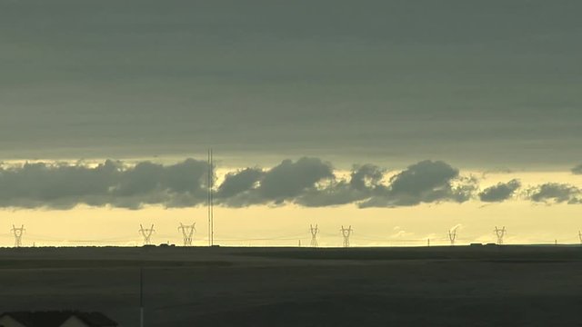 Low Clouds Race over Electrical Transmission Lines