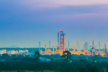 Fototapeta premium Oil refinery industrial plant with sky