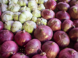 Onions and garlic in basket.