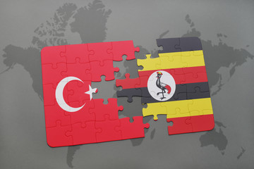 puzzle with the national flag of turkey and uganda on a world map