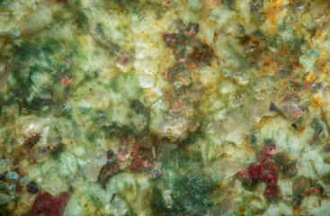 Fototapety  Wielokolorowa skała, mikroskopijny obraz jako teksturowane tło