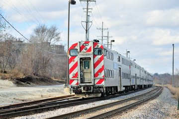 Metra commuter train in Elgin, Illinois on its journey to Chicago about 40 miles away. Metra...