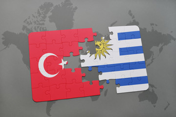 puzzle with the national flag of turkey and uruguay on a world map