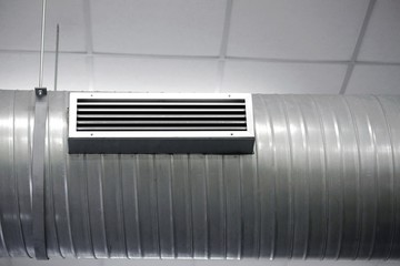 tube of an air conditioning system and the nozzle