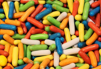 l confetti covered with colored sugar for sale in the candy stor