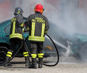 Fototapeta premium team of Italian fire brigade extinguished the car fire