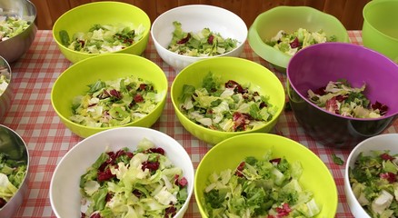 bowls of lettuce and salad in the Italian restaurant