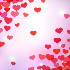 Fototapeta na wymiar Valentines Day background with scattered blurred tender hearts