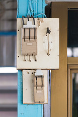 Old electrical power safety breaker with socket outlet.