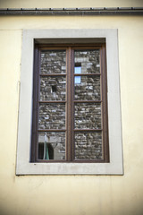 Fototapeta na wymiar Old window in Florence, Italy