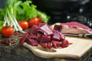 Pieces of meat on the table