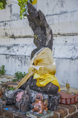 Buddha statue in one of the temples of Thailand.