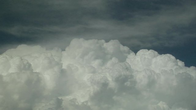 Cumulus Clouds Rapidly Growing Into Cumulonimbus
